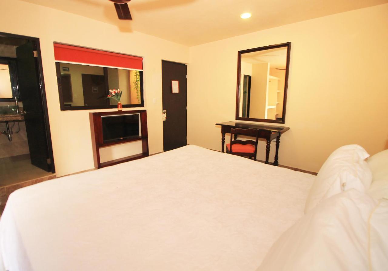 Papagayo Hotel Boutique Playa del Carmen Luaran gambar A room at the hotel
