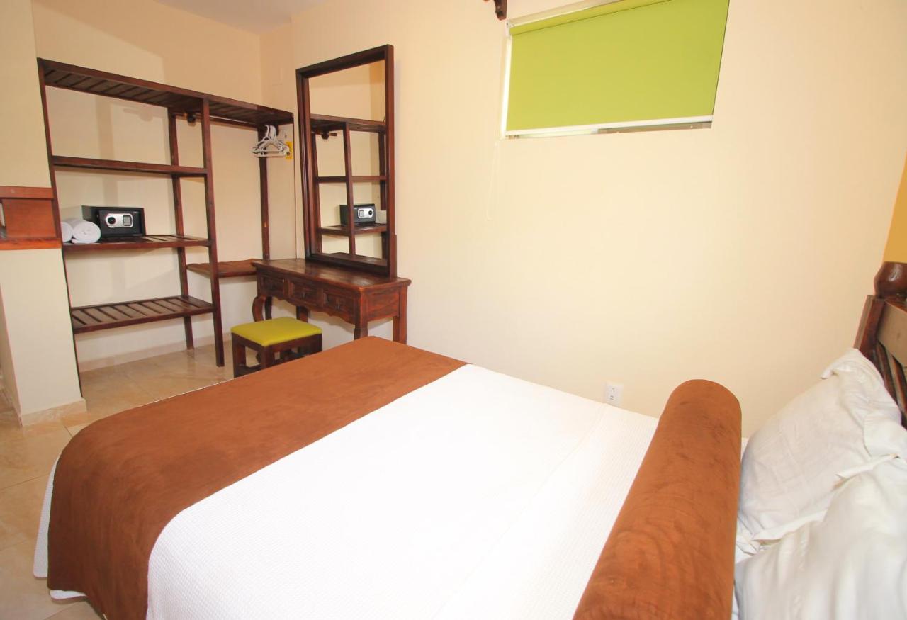 Papagayo Hotel Boutique Playa del Carmen Luaran gambar A bedroom at the hotel