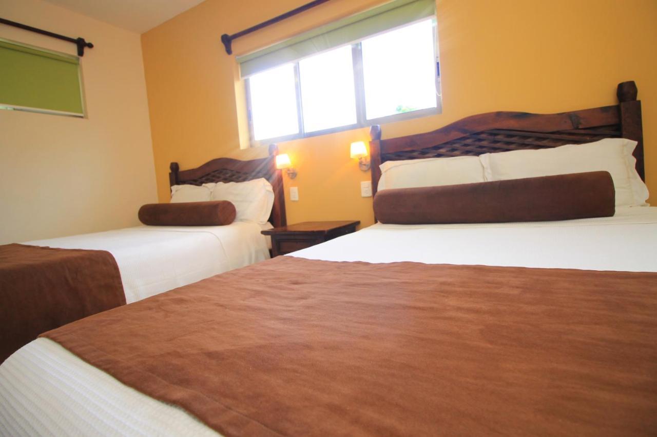 Papagayo Hotel Boutique Playa del Carmen Luaran gambar A room at the hotel