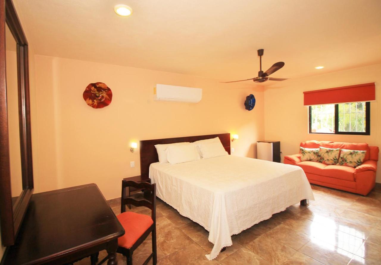 Papagayo Hotel Boutique Playa del Carmen Luaran gambar A bedroom at the hotel